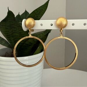 Vintage Monet medium gold door knocker hoop earrings